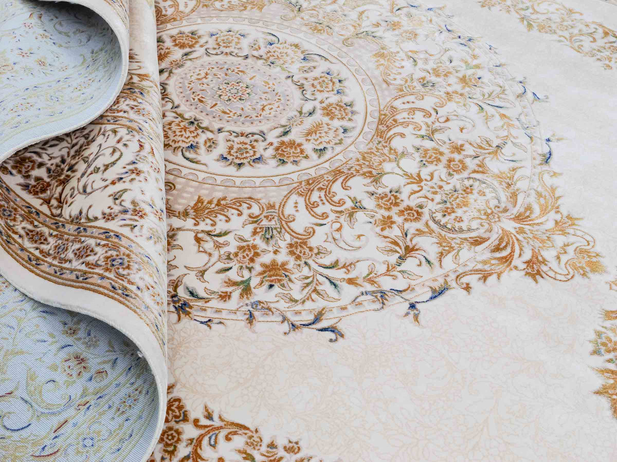 Ghom Maschinenteppich "Pari" 225 x 150 cm, mit Medaillon, aus pflanzlicher Seide (Viskose), Cremeweiß/Gold. Teppichnummer: V68CR338H. Persian Luxury Collection by Khademi. Made in Iran / Persia – Vertrieb durch JUPITER Intl.