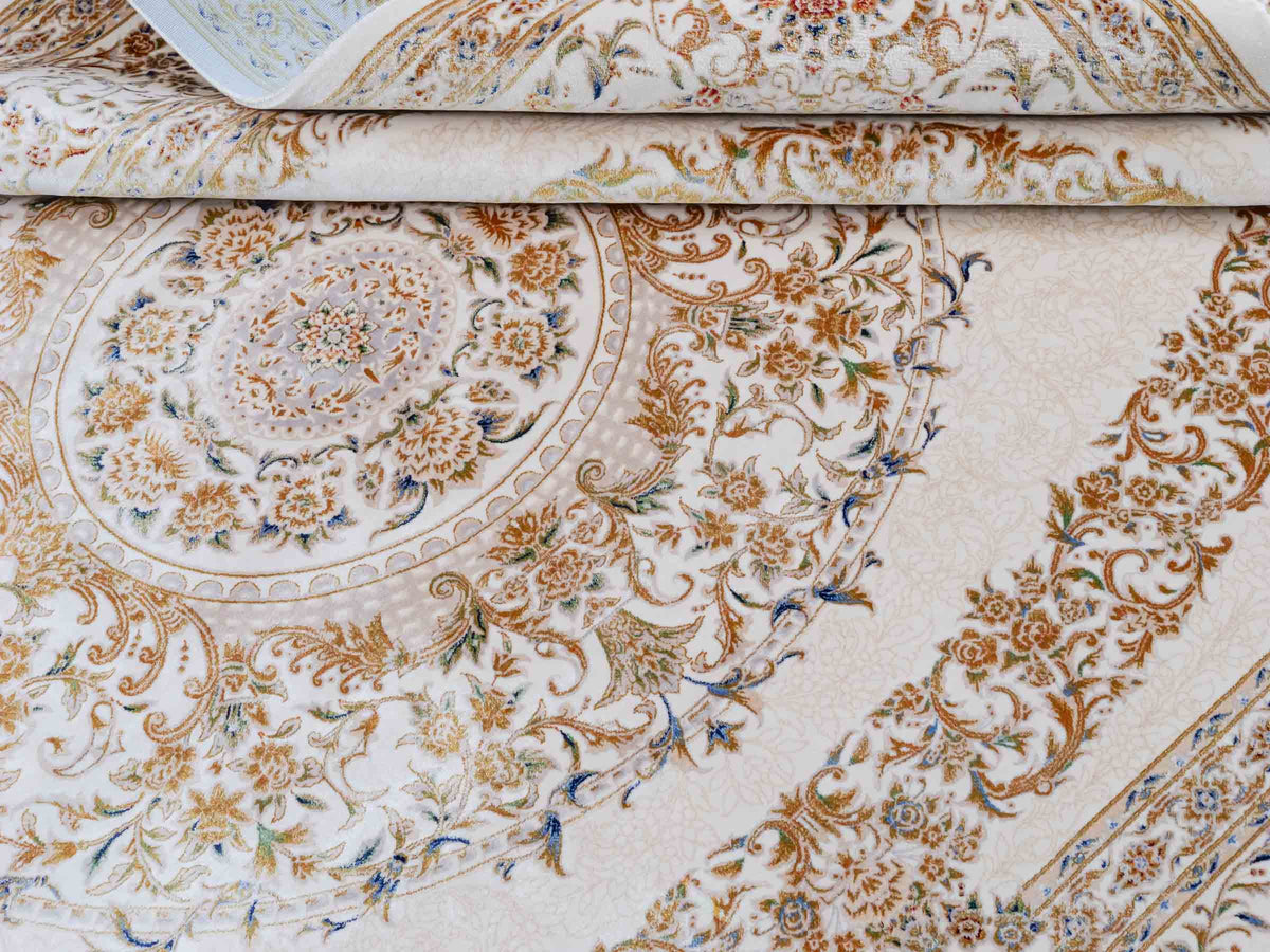 Ghom Maschinenteppich "Pari" 225 x 150 cm, mit Medaillon, aus pflanzlicher Seide (Viskose), Cremeweiß/Gold. Teppichnummer: V68CR338H. Persian Luxury Collection by Khademi. Made in Iran / Persia – Vertrieb durch JUPITER Intl.