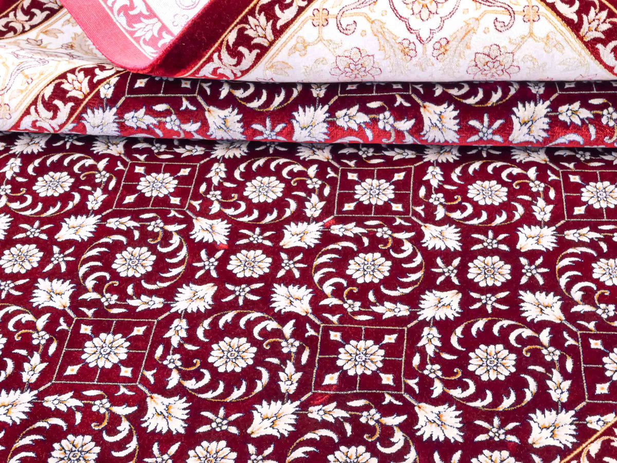 Ghom Maschinenteppich "Rakhsh" 180 x 120 cm, durchgemustert, aus pflanzlicher Seide (Viskose), Dunkelrot/Weiß. Teppichnummer: V71RD216H. Persian Luxury Collection by Khademi. Made in Iran / Persia – Vertrieb durch JUPITER Intl.