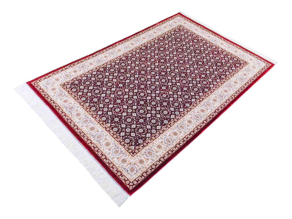 Ghom Maschinenteppich "Rakhsh" 180 x 120 cm, durchgemustert, aus pflanzlicher Seide (Viskose), Dunkelrot/Weiß. Teppichnummer: V71RD216H. Persian Luxury Collection by Khademi. Made in Iran / Persia – Vertrieb durch JUPITER Intl.