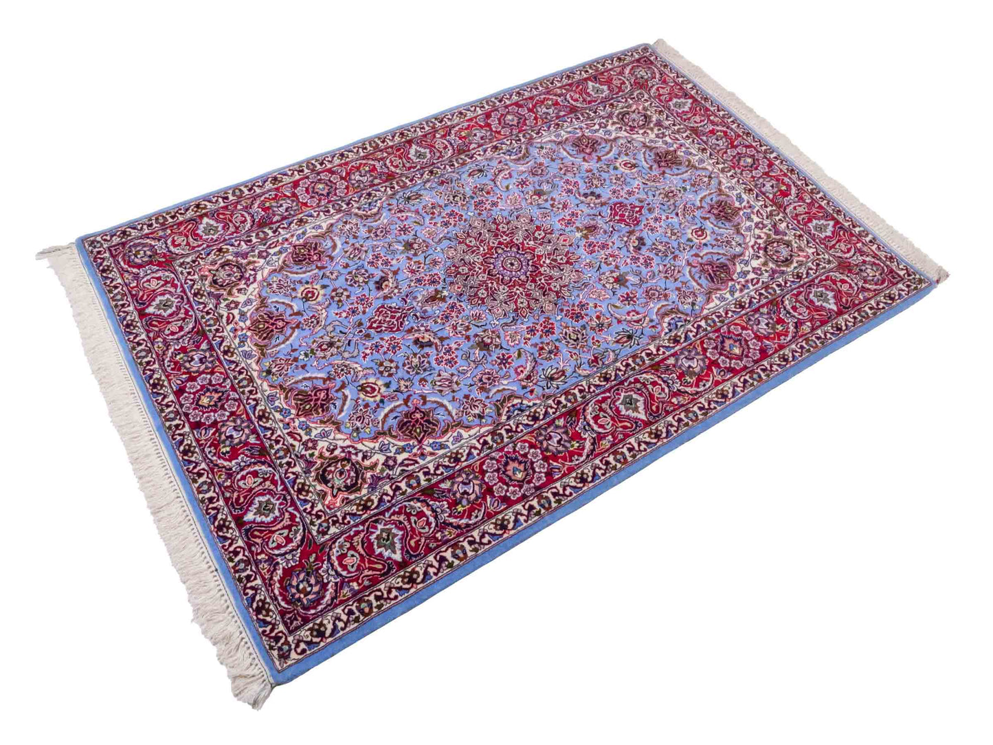 Handgeknüpfter Isfahan Perserteppich von Khademi aus Wolle mit Seide, blau, rot. Feiner, persischer Teppich mit Medaillon. Orientteppich, von Hand geknüpft in Iran. Größe: 171 x 113 cm. Teppichnummer: DB3-1051. Verkauf durch Jupiter Intl.