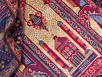 Antiker, handgeknüpfter, afghanischer Belutsch Nomadenteppich aus Wolle von Khademi. Größe: 136 x 87 cm. Farbe: Beige, rot, blau. Verkauf durch JUPITER Intl.