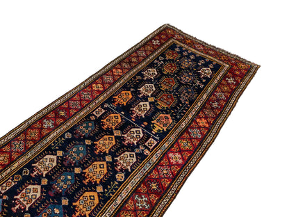 Sehr feiner, handgeknüpfter, antiker, persischer Ghashghai Nomadenteppich aus Wolle von Khademi. Farbe: Blau, rot, beige, cremeweiß. Größe: 346 x 115 cm. Form: Läufer. Vertrieb durch JUPITER Intl.