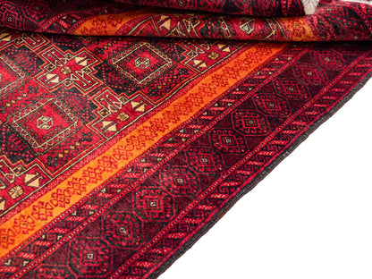 Handgeknüpfter, afghanischer, semi-antiker Belutsch Nomadenteppich aus Wolle von Khademi. Größe: 185 x 100 cm. Farbe: Rot, orange. Verkauf durch JUPITER Intl.