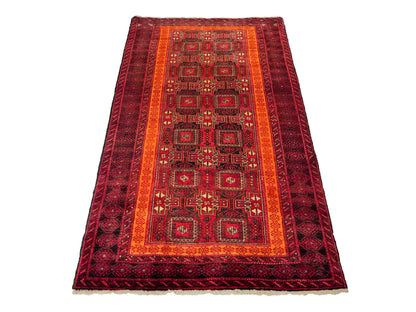 Handgeknüpfter, afghanischer, semi-antiker Belutsch Nomadenteppich aus Wolle von Khademi. Größe: 185 x 100 cm. Farbe: Rot, orange. Verkauf durch JUPITER Intl.