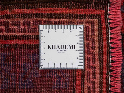 Handgeknüpfter, afghanischer Belutsch Nomadenteppich aus Wolle von Khademi. Größe: 180 x 121 cm. Farbe: Rot, blau. Verkauf durch JUPITER Intl.
