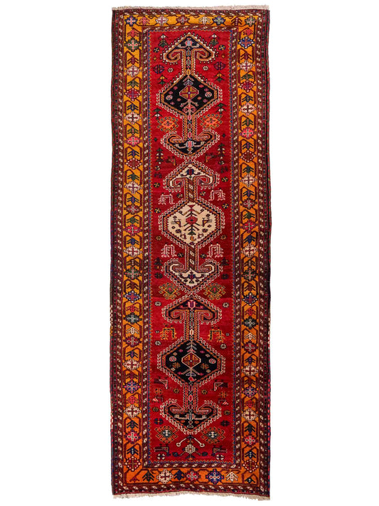 Feiner, handgeknüpfter, persischer Shiraz Nomadenteppich aus Wolle von Khademi. Farbe: Rot, beige, blau. Größe: 318 x 103 cm. Vertrieb durch JUPITER Intl.