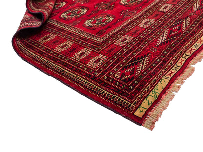 Handgeknüpfter, afghanischer Turkaman Nomadenteppich aus Wolle von Khademi. Größe: 180 x 130 cm. Farbe: Rot. Verkauf durch JUPITER Intl.