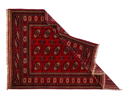 Handgeknüpfter, afghanischer Turkaman Nomadenteppich aus Wolle von Khademi. Größe: 180 x 130 cm. Farbe: Rot. Verkauf durch JUPITER Intl.