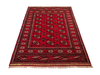 Handgeknüpfter, afghanischer Turkaman Nomadenteppich aus Wolle von Khademi. Größe: 180 x 130 cm. Farbe: Rot. Verkauf durch JUPITER Intl.