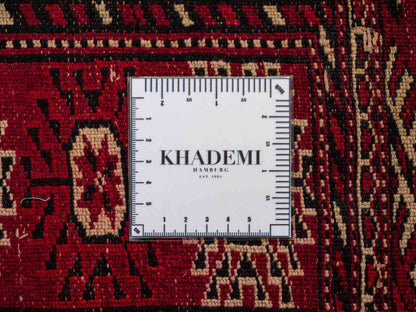 Handgeknüpfter, afghanischer Turkaman Nomadenteppich aus Wolle von Khademi. Größe: 182 x 137 cm. Farbe: Rot. Verkauf durch JUPITER Intl.