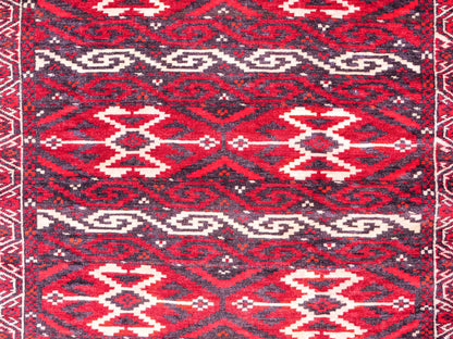 Feiner, handgeknüpfter Afghan Wollteppich von Khademi. Größe: 165 x 90 cm. Farbe: Rot. Verkauf durch JUPITER Intl.