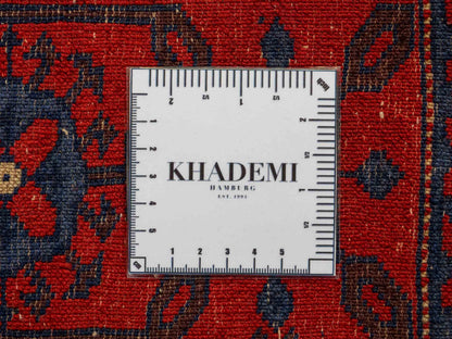 Feiner, handgeknüpfter Afghan Wollteppich von Khademi. Größe: 170 x 130 cm. Farbe: Rot, grün. Verkauf durch JUPITER Intl.