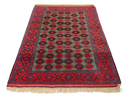Feiner, handgeknüpfter Afghan Wollteppich von Khademi. Größe: 170 x 130 cm. Farbe: Rot, grün. Verkauf durch JUPITER Intl.