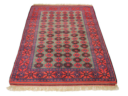 Feiner, handgeknüpfter Afghan Wollteppich von Khademi. Größe: 170 x 130 cm. Farbe: Rot, grün. Verkauf durch JUPITER Intl.
