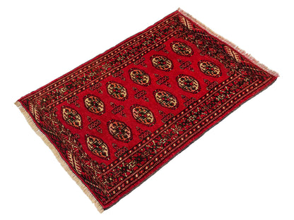 Antiker, handgeknüpfter Afghan Orientteppich aus Wolle von Khademi. Größe: 103 x 73 cm. Farbe: Rot. Verkauf durch JUPITER Intl.