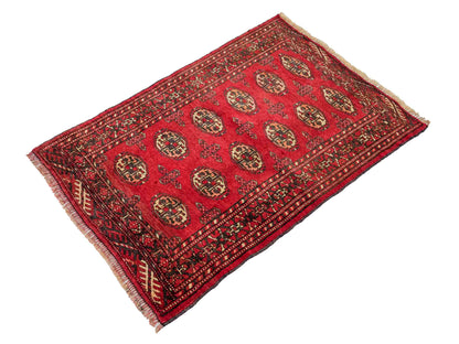 Antiker, handgeknüpfter Afghan Orientteppich aus Wolle von Khademi. Größe: 103 x 73 cm. Farbe: Rot. Verkauf durch JUPITER Intl.