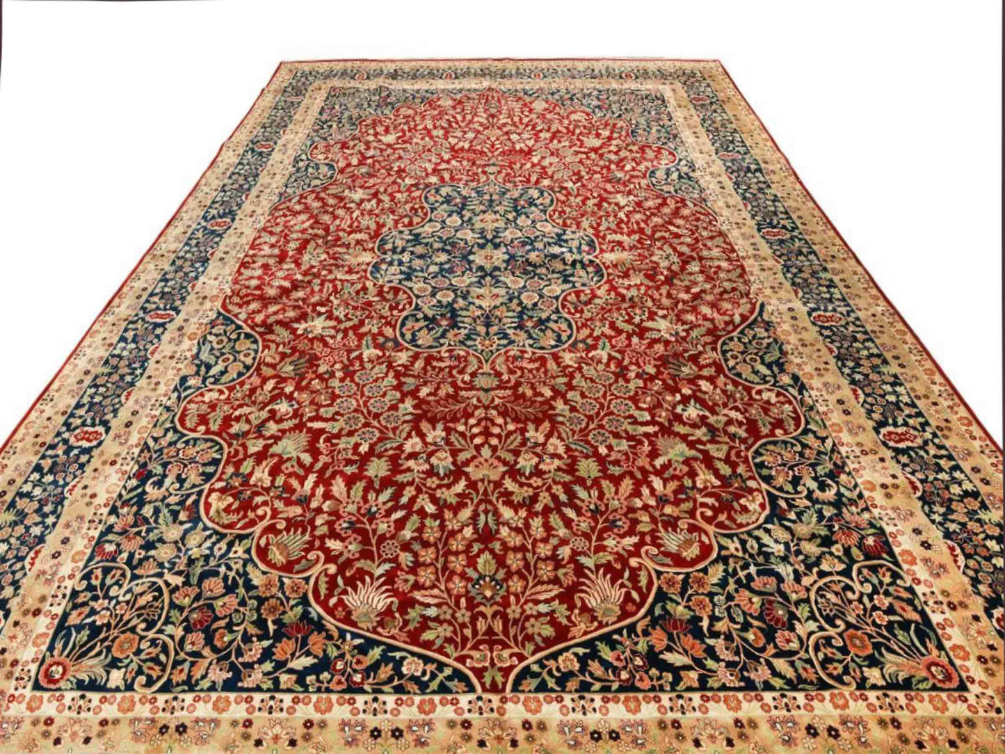Sehr feiner, handgeknüpfter, indischer Orientteppich mit Ghom Design aus Wolle, rot, beige, blau. 536x366 cm. Vertrieb durch Jupiter Intl.