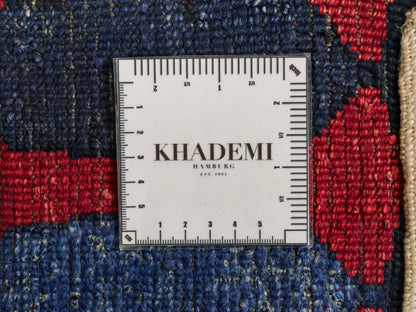 Handgeknüpfter Indo Loribaft Orientteppich von Khademi aus Viskose, Nomaden-Design, rot, blau. Von Hand geknüpft in Indien. Größe: 89x63cm. Teppichnummer: KB4-1742. Verkauf durch Jupiter Intl.