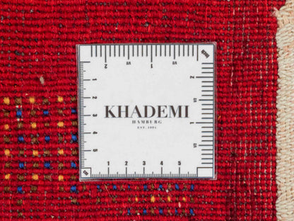 Handgeknüpfter Indo Loribaft Orientteppich von Khademi aus Wolle, rot. Geometrisches Nomaden-Design. Von Hand geknüpft in Indien. Größe: 100x61cm. Teppichnummer: KB4-1760. Verkauf durch Jupiter Intl.