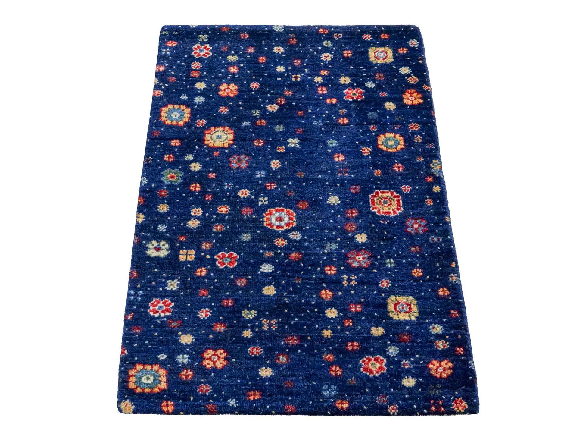 Handgeknüpfter Indo Loribaft Orientteppich von Khademi aus Wolle, blau. Florales Nomaden-Design. Von Hand geknüpft in Indien. Größe: 87x58cm. Teppichnummer: KB4-1743. Verkauf durch Jupiter Intl.