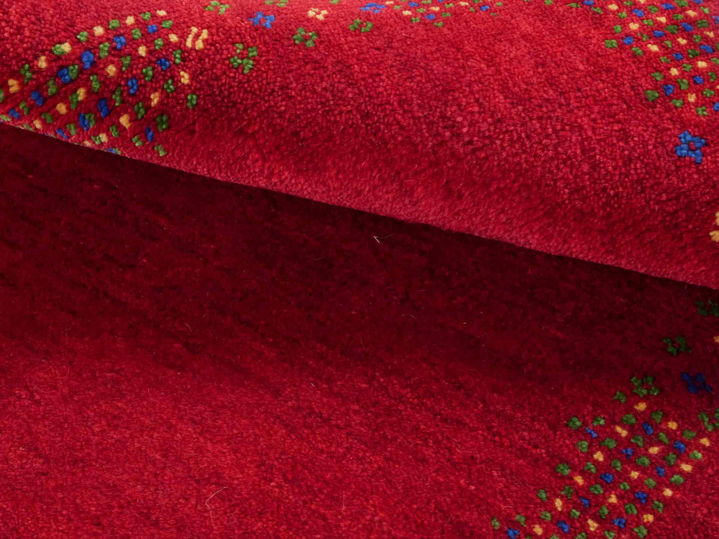 Handgeknüpfter Indo Loribaft Orientteppich von Khademi aus Wolle, rot. Geometrisches Nomaden-Design. Von Hand geknüpft in Indien. Größe: 92x62cm. Teppichnummer: KB4-1729. Verkauf durch Jupiter Intl.