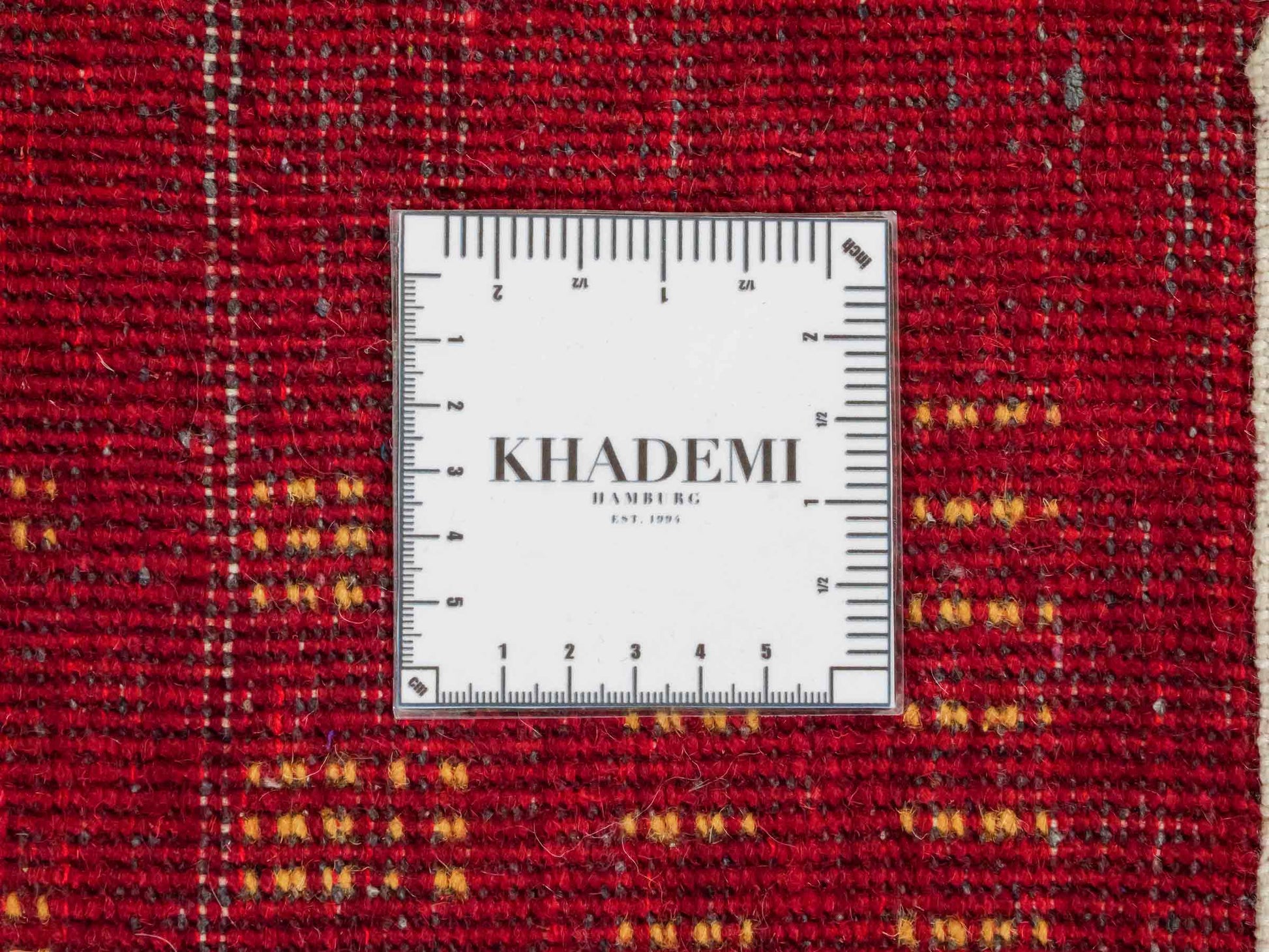 Handgeknüpfter Indo Loribaft Orientteppich von Khademi aus Wolle, rot. Geometrisches Nomaden-Design. Von Hand geknüpft in Indien. Größe: 92x65cm. Teppichnummer: KB4-1764. Verkauf durch Jupiter Intl.