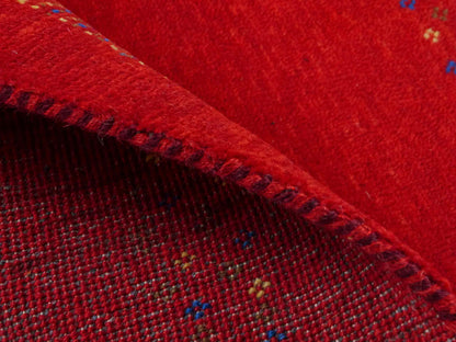 Handgeknüpfter Indo Loribaft Orientteppich von Khademi aus Wolle, rot. Geometrisches Nomaden-Design. Von Hand geknüpft in Indien. Größe: 93x62cm. Teppichnummer: KB4-1721. Verkauf durch Jupiter Intl.