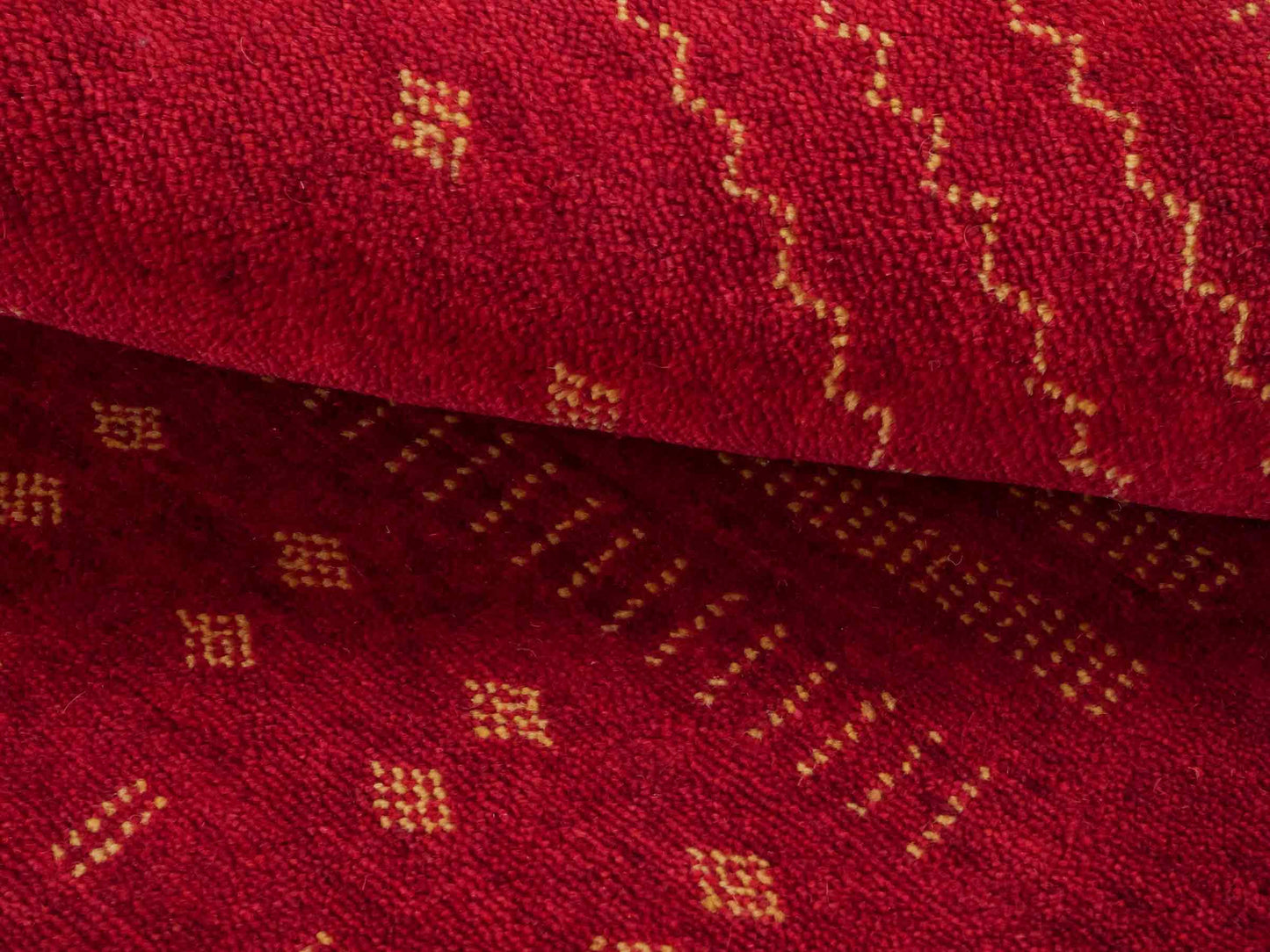 Handgeknüpfter Indo Loribaft Orientteppich von Khademi aus Wolle, rot. Geometrisches Nomaden-Design. Von Hand geknüpft in Indien. Größe: 93x65cm. Teppichnummer: KB4-1723. Verkauf durch Jupiter Intl.