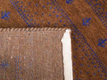 Handgeknüpfter Indo Loribaft Orientteppich von Khademi aus Wolle, braun. Geometrisches Nomaden-Design. Von Hand geknüpft in Indien. Größe: 95x62cm. Teppichnummer: KB4-1745. Verkauf durch Jupiter Intl.