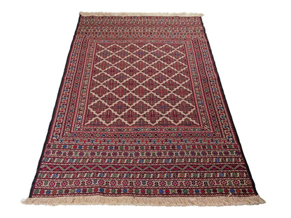 Handgefertigter Kelim Afghan Teppich aus Wolle von Khademi. Größe 193 x 130 cm. Farbe: Beige, rot, blau. Verkauf durch JUPITER Intl.