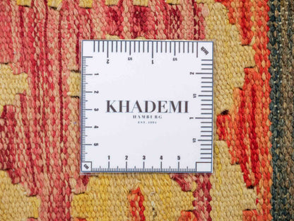 Handgewebter Kelim Afghan Teppich aus Wolle von Khademi. Größe 296 x 190 cm. Farbe: Rosa, rot, grün. Verkauf durch JUPITER Intl.