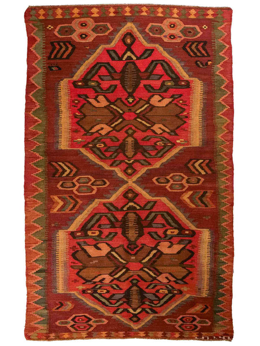 Antiker, handgeknüpfter, kaukasischer Kelim aus Wolle von Khademi. Farbe: Braun, beige, gelb,  orange, grün. Größe: 263 x 126 cm. Verkauf durch JUPITER Intl.