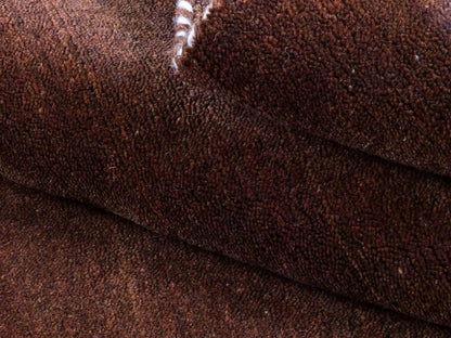 Moderner, Handloom Lori Gabbeh Orientteppich von Khademi aus Wolle, braun. Nomaden-Design. Produziert in Indien. Größe: 198x76cm. Teppichnummer: KB4-1595. Verkauf durch Jupiter Intl.