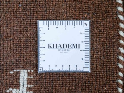 Moderner, Handloom Lori Gabbeh Orientteppich von Khademi aus Wolle, braun. Nomaden-Design. Produziert in Indien. Größe: 198x76cm. Teppichnummer: KB4-1595. Verkauf durch Jupiter Intl.