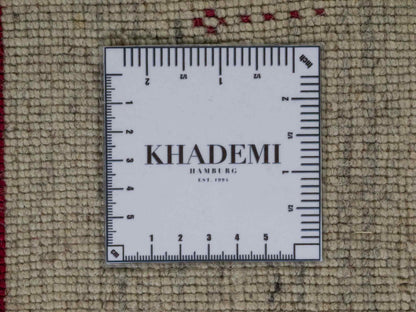 Moderner, Handloom Lori Gabbeh Orientteppich von Khademi aus Wolle, cremeweiß, mehrfarbig. Geometrisches Nomaden-Design. Produziert in Indien. Größe: 201x143cm. Teppichnummer: KB4-1780. Verkauf durch Jupiter Intl.