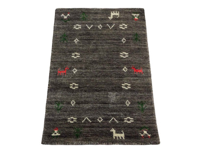 Moderner, Handloom Lori Gabbeh Orientteppich von Khademi aus Wolle, grau. Nomaden-Design. Produziert in Indien. Größe: 60x40cm. Teppichnummer: KB4-1617A. Verkauf durch Jupiter Intl.