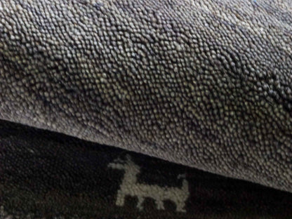 Moderner, Handloom Lori Gabbeh Orientteppich von Khademi aus Wolle, grau. Nomaden-Design. Produziert in Indien. Größe: 60x40cm. Teppichnummer: KB4-1617A. Verkauf durch Jupiter Intl.