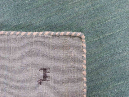 Moderner, Handloom Lori Gabbeh Orientteppich von Khademi aus Wolle, hellblau, türkis. Nomaden-Design. Produziert in Indien. Größe: 80x76cm. Teppichnummer: KB4-1601. Verkauf durch Jupiter Intl.