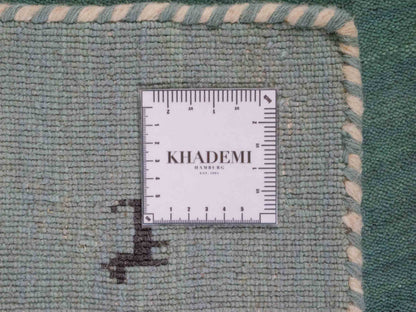 Moderner, Handloom Lori Gabbeh Orientteppich von Khademi aus Wolle, hellblau, türkis. Nomaden-Design. Produziert in Indien. Größe: 80x76cm. Teppichnummer: KB4-1601. Verkauf durch Jupiter Intl.