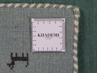 Moderner, Handloom Lori Gabbeh Orientteppich von Khademi aus Wolle, hellblau, türkis. Nomaden-Design. Produziert in Indien. Größe: 81x77cm. Teppichnummer: KB4-1602. Verkauf durch Jupiter Intl.