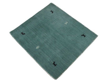 Moderner, Handloom Lori Gabbeh Orientteppich von Khademi aus Wolle, hellblau, türkis. Nomaden-Design. Produziert in Indien. Größe: 81x77cm. Teppichnummer: KB4-1602. Verkauf durch Jupiter Intl.