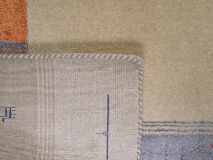 Moderner, Handloom Lori Gabbeh Orientteppich von Khademi aus Wolle mit Bambusseide, cremeweiß, beige, mehrfarbig. Nomaden-Design. Produziert in Indien. Größe: 240x170cm. Teppichnummer: KB4-1818. Verkauf durch Jupiter Intl.