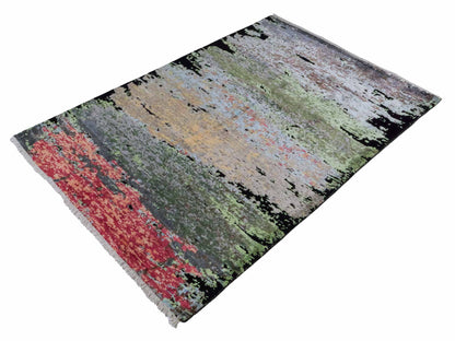 Handgeknüpfter Designer Orientteppich von Khademi aus Wolle mit Viskose, schwarz, mehrfarbig. Abstraktes Design. Von Hand geknüpft in Indien. Größe: 180x123cm. Teppichnummer: KB4-1628. Verkauf durch Jupiter Intl.