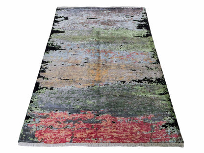 Handgeknüpfter Designer Orientteppich von Khademi aus Wolle mit Viskose, schwarz, mehrfarbig. Abstraktes Design. Von Hand geknüpft in Indien. Größe: 180x123cm. Teppichnummer: KB4-1628. Verkauf durch Jupiter Intl.