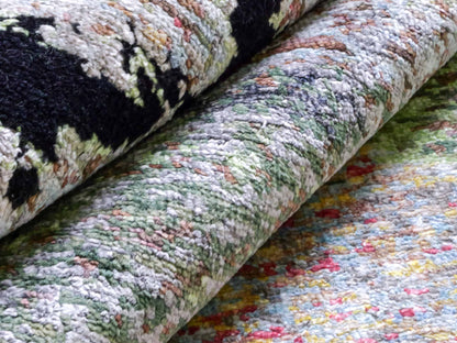 Handgeknüpfter Designer Orientteppich von Khademi aus Wolle mit Viskose, schwarz, mehrfarbig. Abstraktes Design. Von Hand geknüpft in Indien. Größe: 204x150cm. Teppichnummer: KB4-1624. Verkauf durch Jupiter Intl.