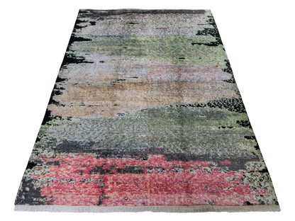 Handgeknüpfter Designer Orientteppich von Khademi aus Wolle mit Viskose, schwarz, mehrfarbig. Abstraktes Design. Von Hand geknüpft in Indien. Größe: 204x150cm. Teppichnummer: KB4-1624. Verkauf durch Jupiter Intl.