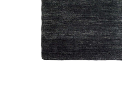 Moderner, Handloom Gabbeh Orientteppich von Khademi aus Wolle, grau. Einfarbiges Uni-Design. Produziert in Indien. Größe: 145x90cm. Teppichnummer: KB4-1540. Verkauf durch Jupiter Intl.