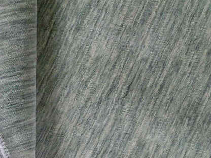 Moderner, Handloom Gabbeh Orientteppich von Khademi aus Wolle, mintgrün. Einfarbiges Uni-Design. Produziert in Indien. Größe: 151x78cm. Teppichnummer: KB4-1565. Verkauf durch Jupiter Intl.