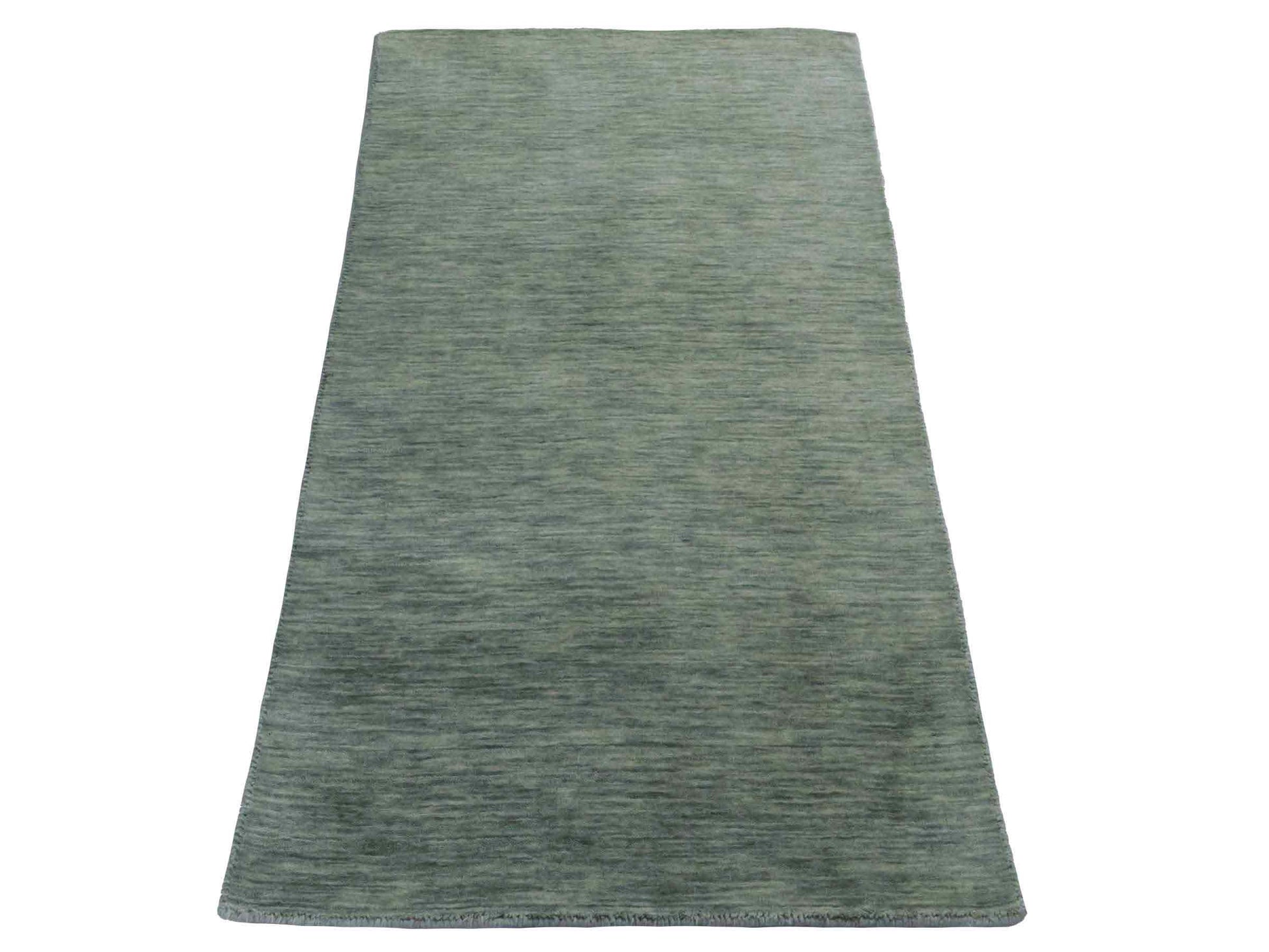 Moderner, Handloom Gabbeh Orientteppich von Khademi aus Wolle, mintgrün. Einfarbiges Uni-Design. Produziert in Indien. Größe: 151x78cm. Teppichnummer: KB4-1565. Verkauf durch Jupiter Intl.